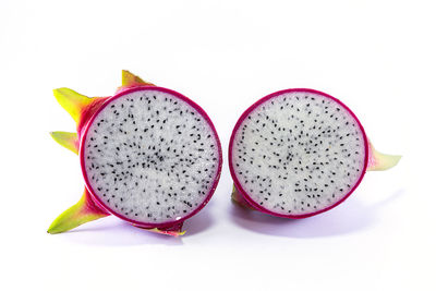 High angle view of fruits against white background