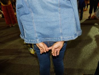 Low section of woman standing on floor