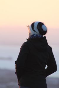 Woman looking at sunset