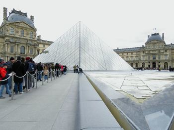 Group of people in front of historical building