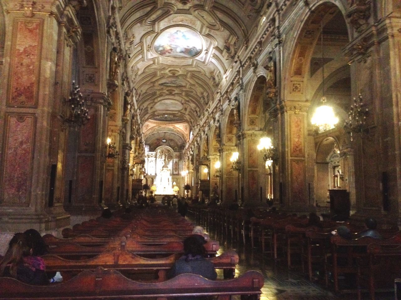 indoors, arch, interior, illuminated, ceiling, the way forward, architecture, corridor, built structure, place of worship, diminishing perspective, architectural column, lighting equipment, church, religion, spirituality, history, tunnel