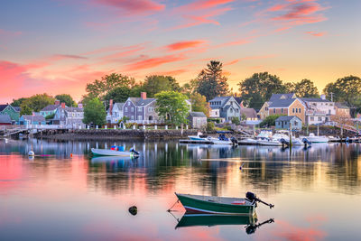 Scenic view of lake against sky during sunset