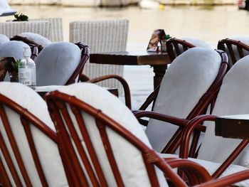 Close-up of white chairs