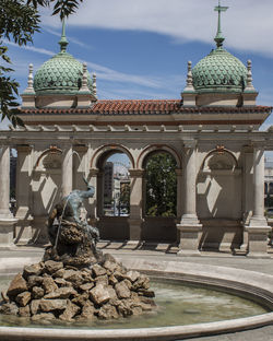 The historical castle garden bazaar in budapest, hungary. statues, ornaments, and turquoise domes