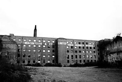 Abandoned building against clear sky