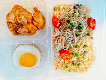 Close-up of served food in plate on table