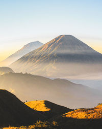 Mountains shrouded in fog