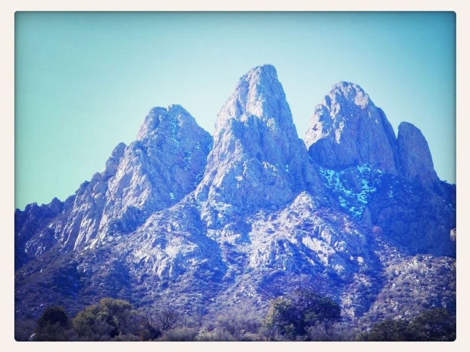 mountain, snow, mountain range, transfer print, winter, cold temperature, tranquil scene, scenics, tranquility, beauty in nature, clear sky, blue, snowcapped mountain, nature, auto post production filter, season, landscape, majestic, copy space, rocky mountains