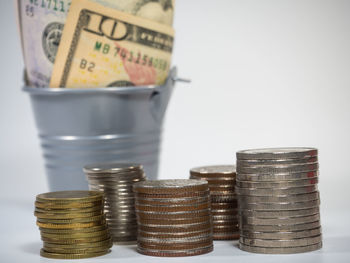 Close-up of coin stack on table