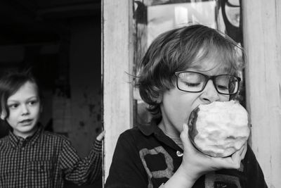 Portrait of boy eating an apple