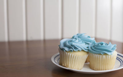 Close-up of cupcakes on table