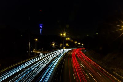 Light trails on road at night