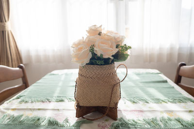 Woman holding flower bouquet