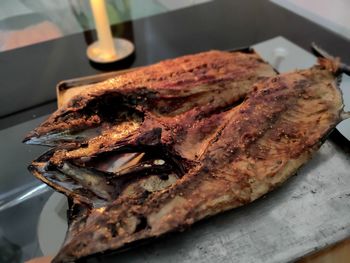 High angle view of meat in plate on table