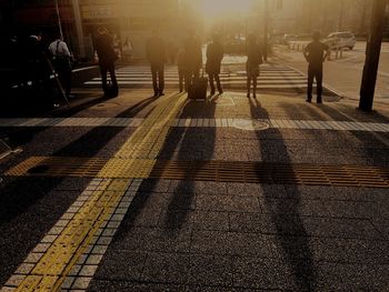 People walking on street in city