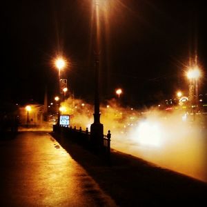 Illuminated street light at night