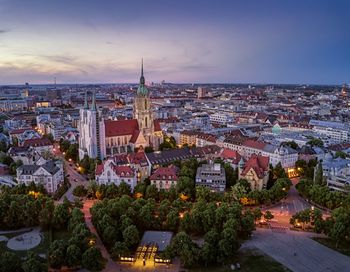 High angle view of town at sunset