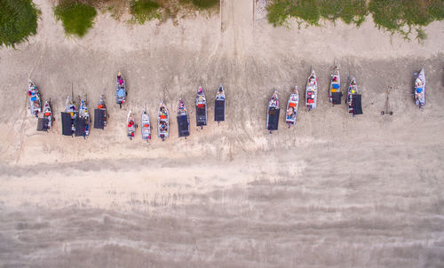 Aerial view of boats moored at beach