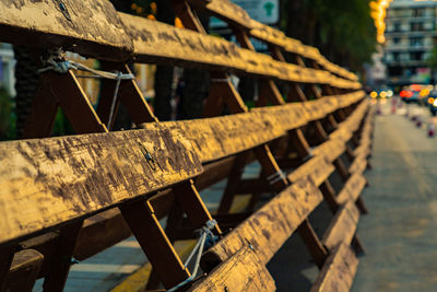 Close-up of rusty wheel in city