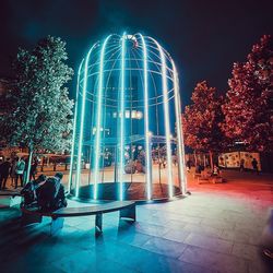 Illuminated building lit up at night