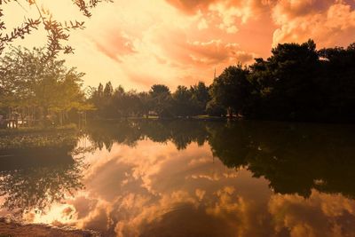 Scenic view of lake against sky during sunset