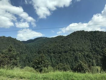 Scenic view of land against sky