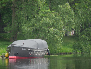 Scenic view of lake against trees