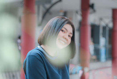 Portrait of smiling young woman