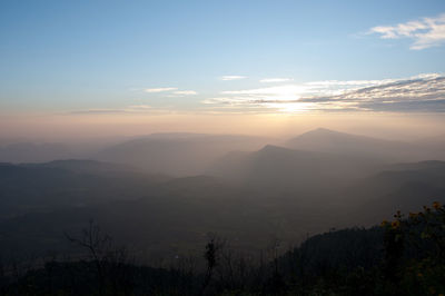 Scenic view of mountains against sky during sunset