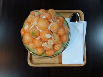 High angle view of fruits in bowl on table