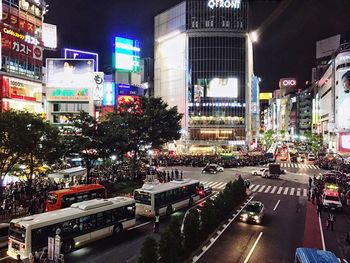 Buildings in city at night