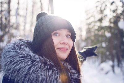 Portrait of young woman in winter