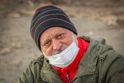 Portrait of man wearing hat during winter