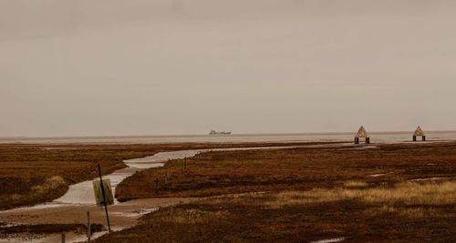 Scenic view of beach against sky