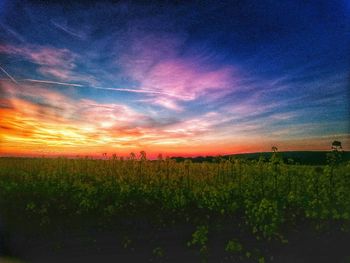 Scenic view of landscape at sunset