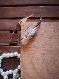 High angle view of keys on wooden table