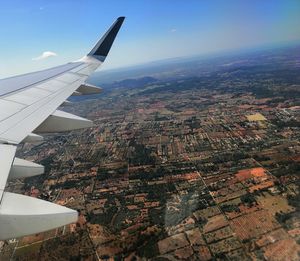 Aerial view of cityscape against sky