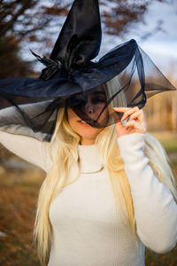 Rear view of woman wearing hat