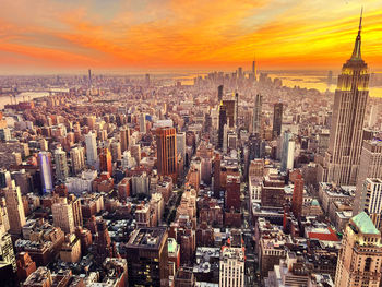 High angle view of cityscape against sky during sunset