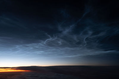 Scenic view of dramatic sky during sunset