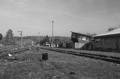 Train on railroad track against sky