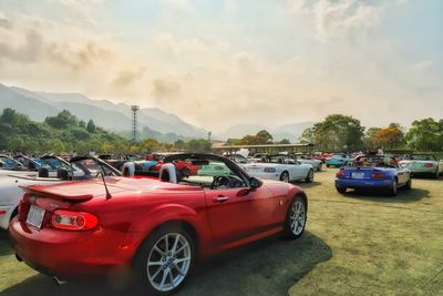 Vintage car on mountain against sky