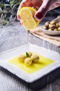 High angle view of fruits in plate on table