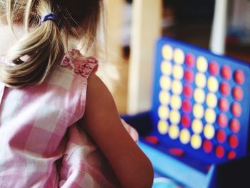 Girl playing connect 4