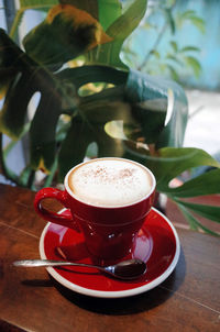 Close-up of coffee cup on table