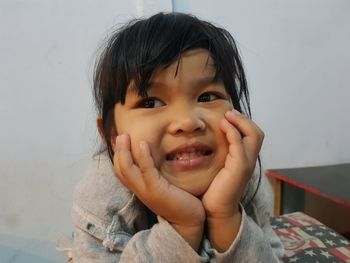 Portrait of cute boy at home