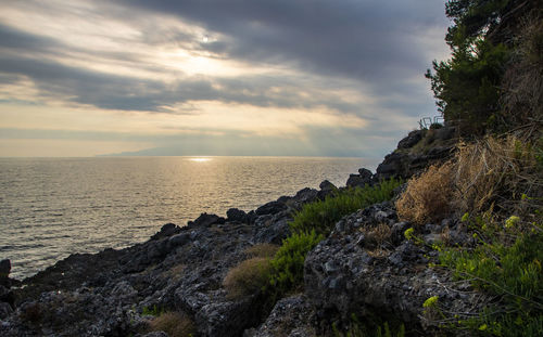 Scenic view of sea against sky during sunset