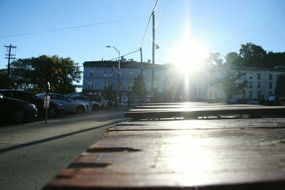 Sun shining over road