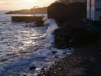 Scenic view of sea against sky during sunset