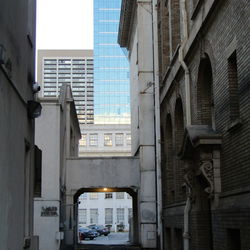 Narrow street amidst buildings